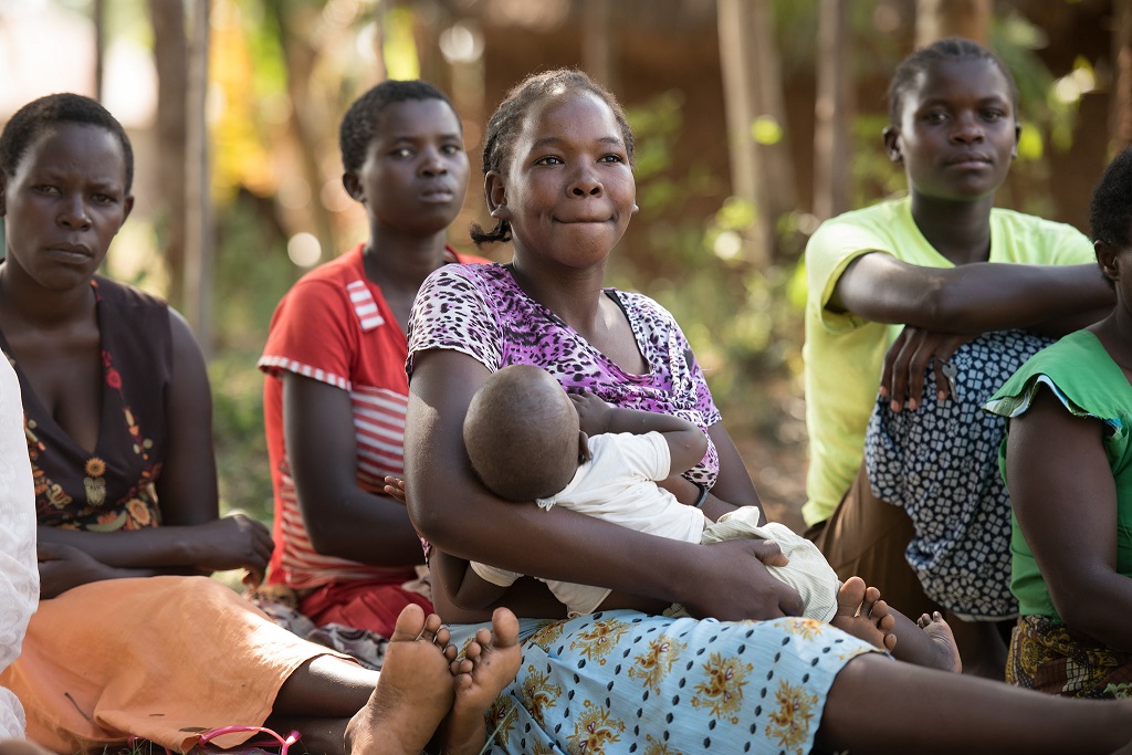 Mothers in Migori, Kenya are reminded of the importance of breastfeeding at a weekly meeting.