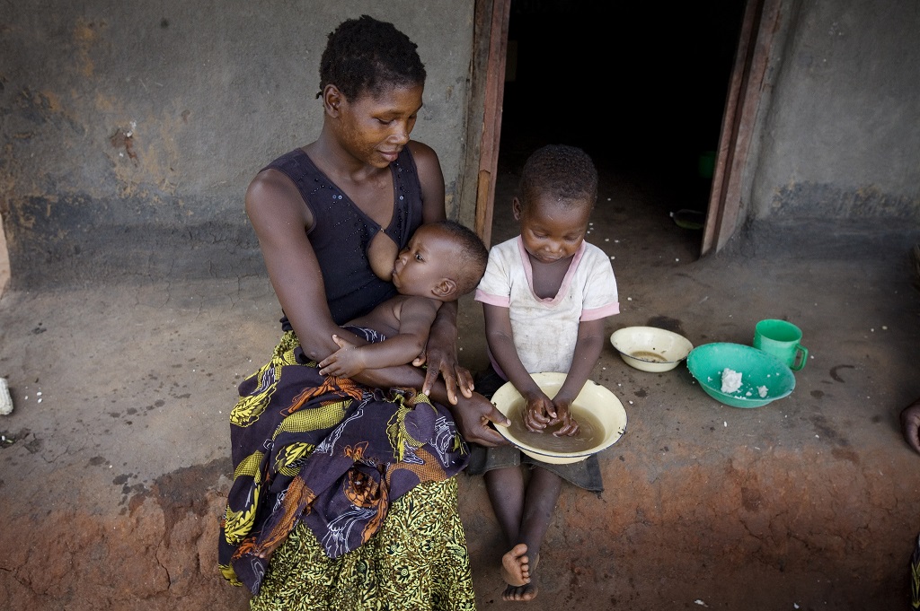 Mother and children at home in Tanzania.