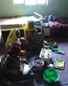 Coffee ceremony in the postnatal room of Karamile Health Center.