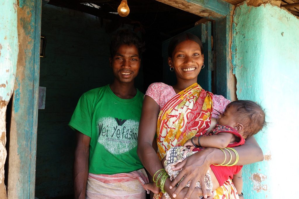 Mother, father and baby in India