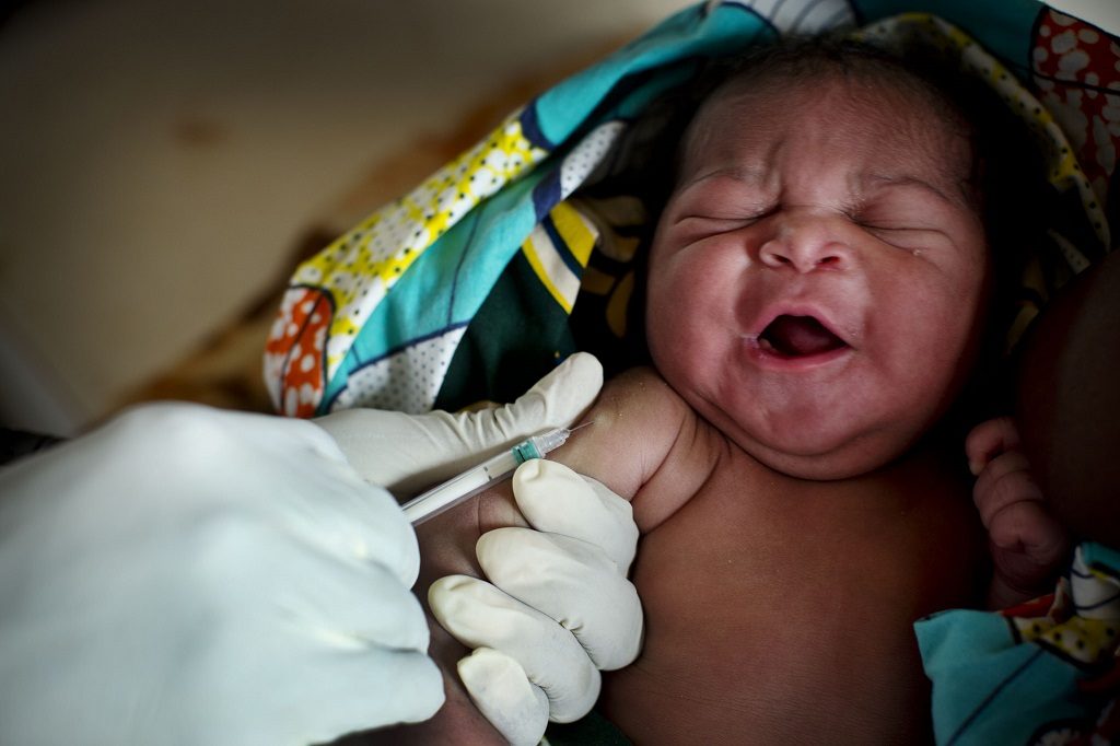 Baby receiving vaccination shot