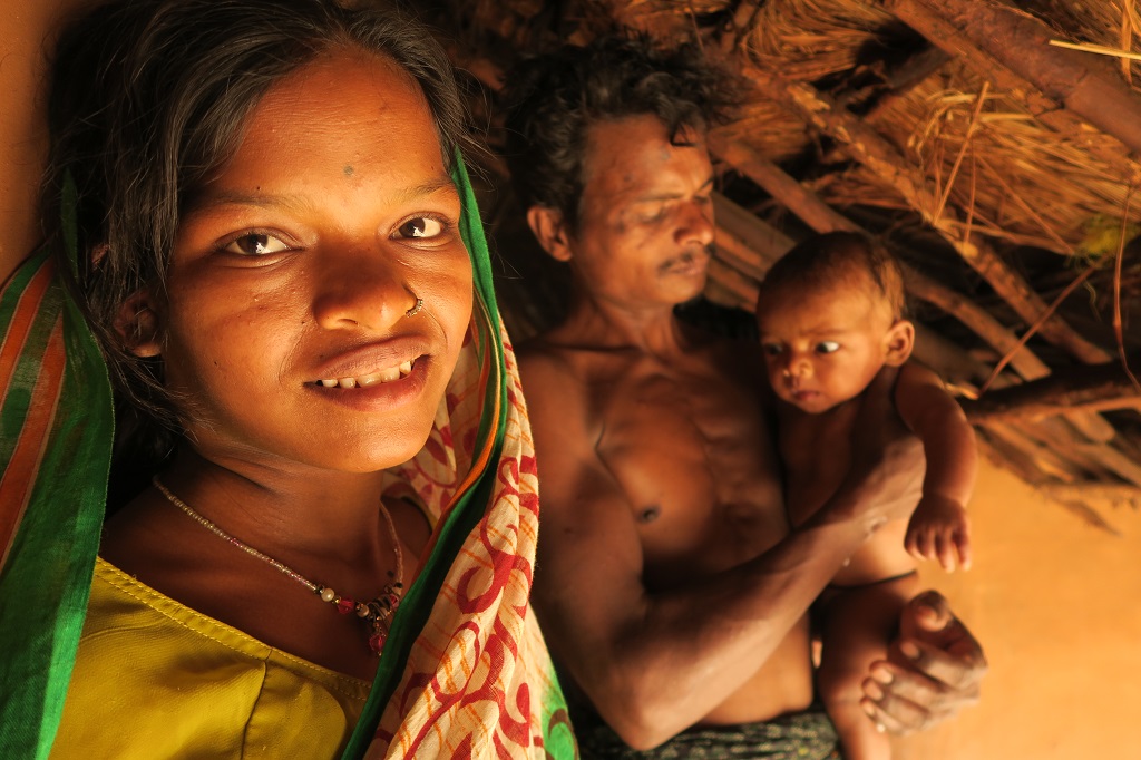 Geetanjali Dehuri, her husband and newborn Gobinda at home