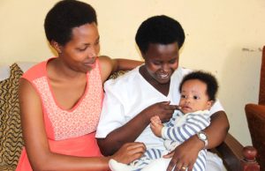 Anna Mukashyaka and 5-month-old Yvan visit Midwife Pauline Mukabasinga.