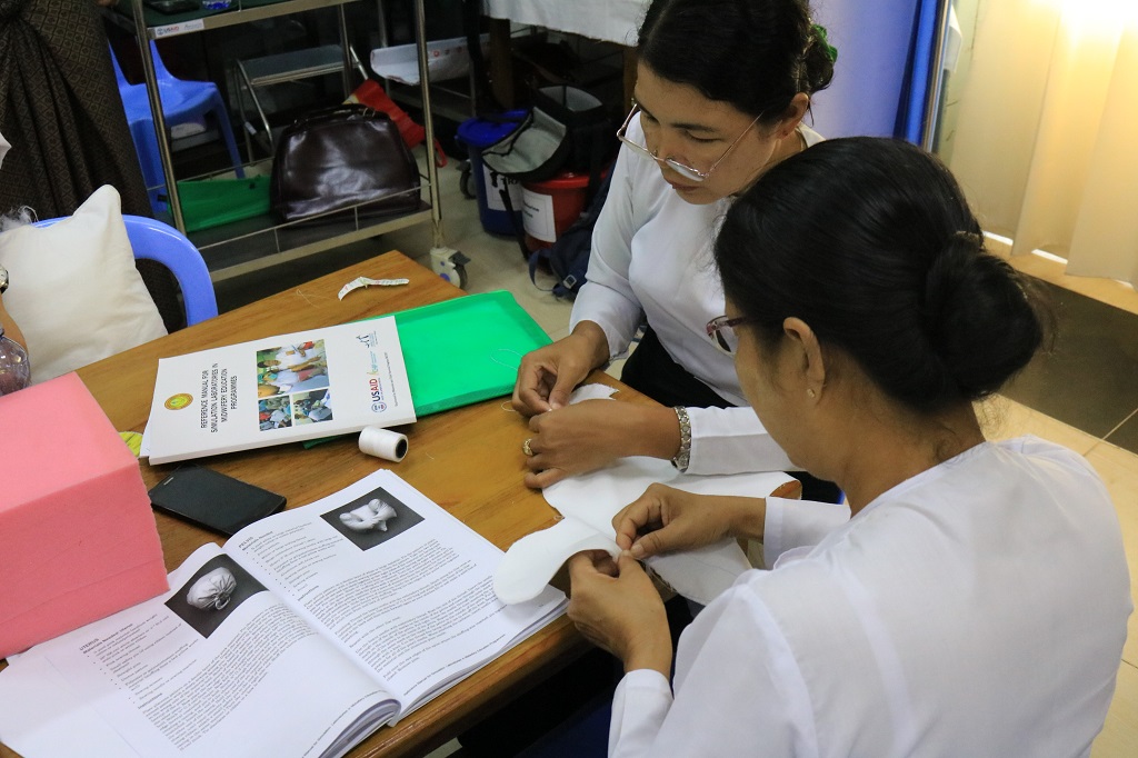 A Skills Lab Management Team practices making simulation models with locally available materials for use at L&PIC, Sittwe, Rakhine State.