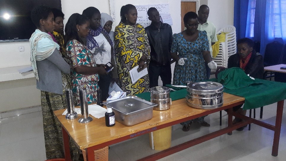 Demonstrating PPIUD insertion in Rwamagana district during a training of providers.