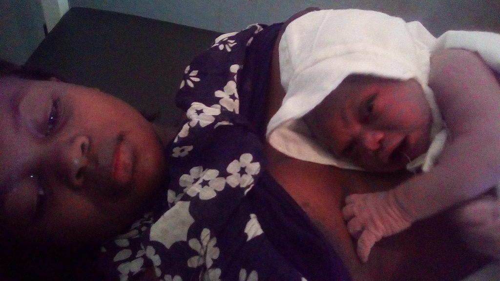 Esthelle and her newborn daughter.