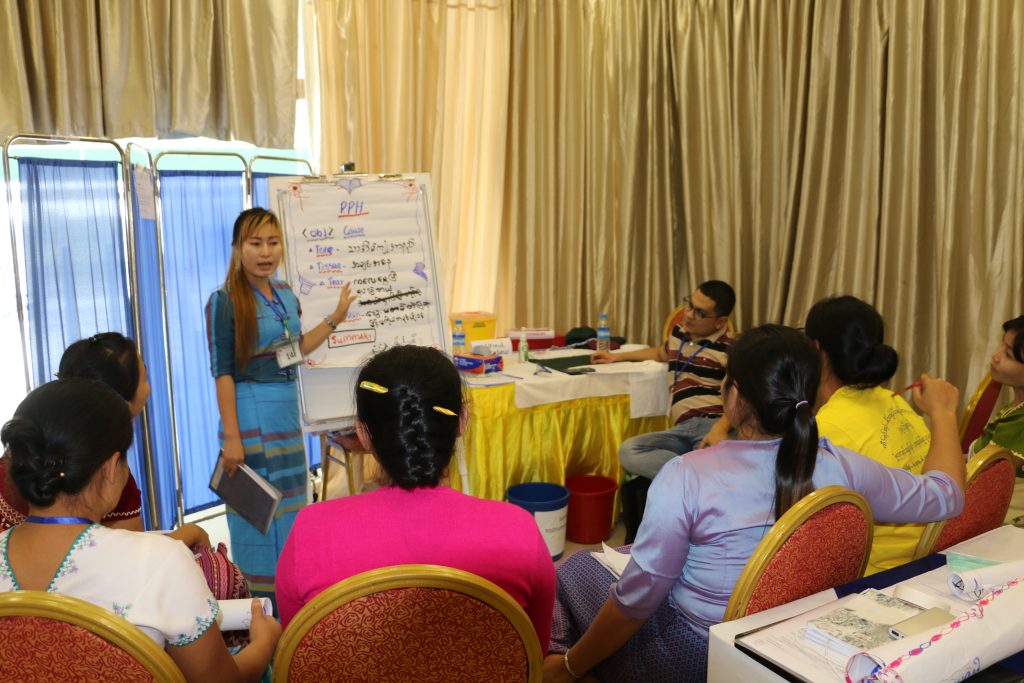 Naw Eh Paw Htoo lecturing at a training of midwives