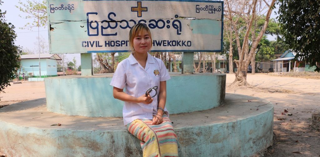 Naw Eh Paw Htoo sitting outside