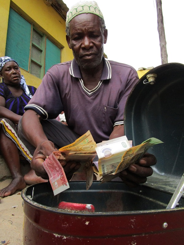 In Ratane, VICOBA collected money inside the community box.