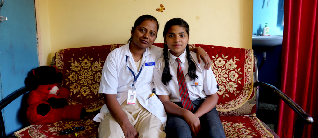 Rekha Amba Das at home with her daughter, Mansi.