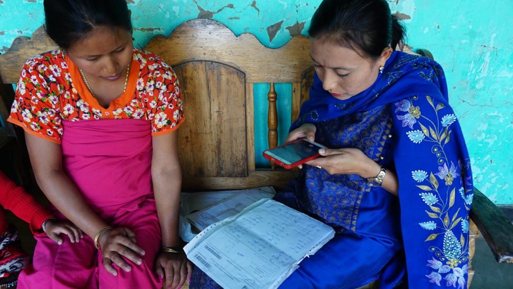 Ranita tele-consults about a patient’s condition with a doctor based elsewhere.